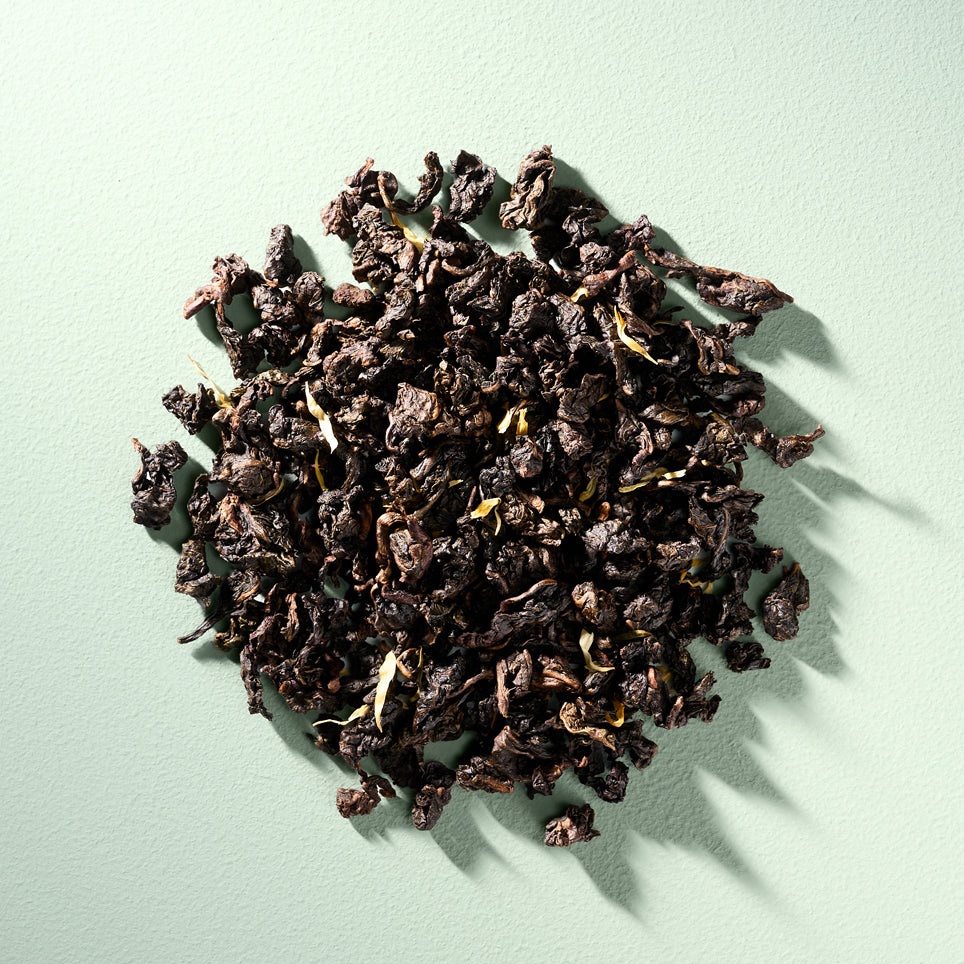 Nahaufnahme von der Teemischung Creamy Peach Oolongtee